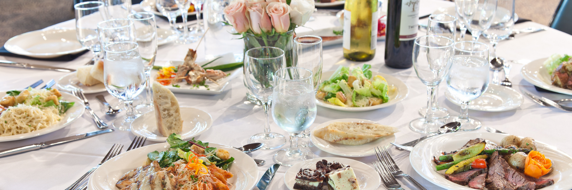 Elegant table set up with catered meals